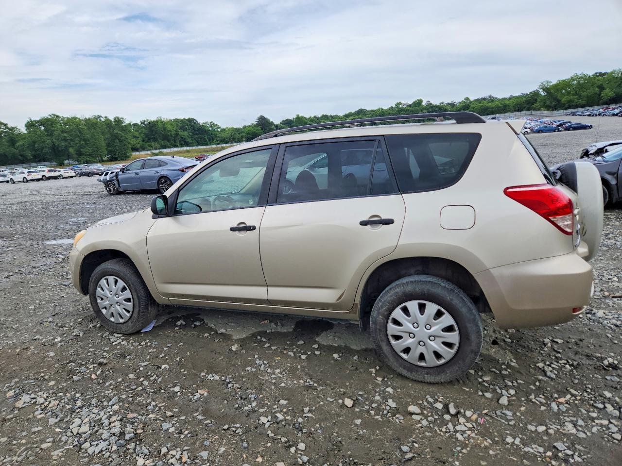 2007 Toyota Rav4 Base Gold vin: JTMZD33V676037064