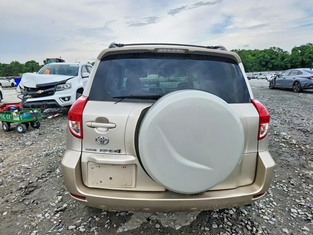 2007 Toyota Rav4 Base Gold vin: JTMZD33V676037064