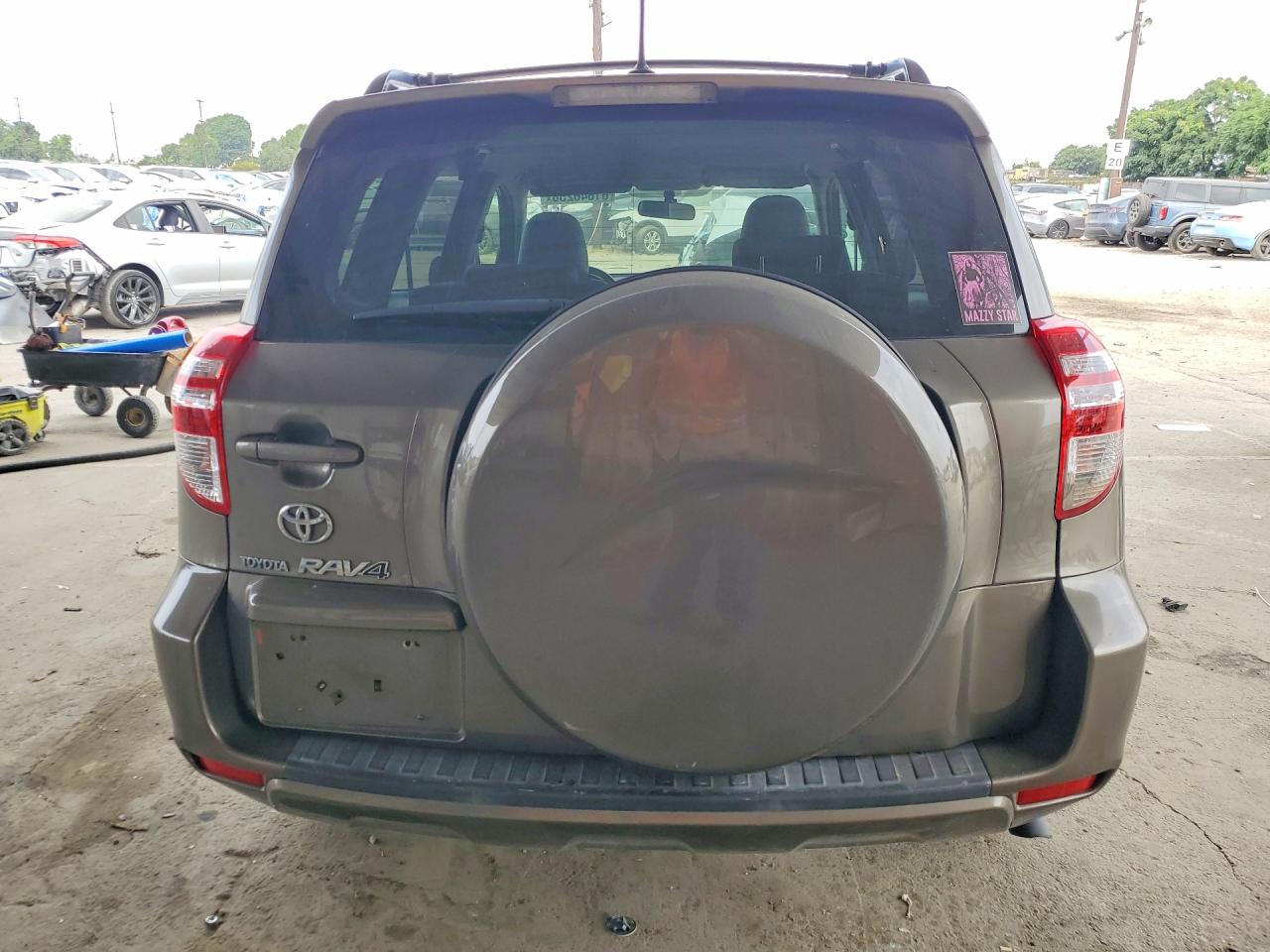 2009 Toyota Rav4 Base Tan vin: JTMZF33V095013460