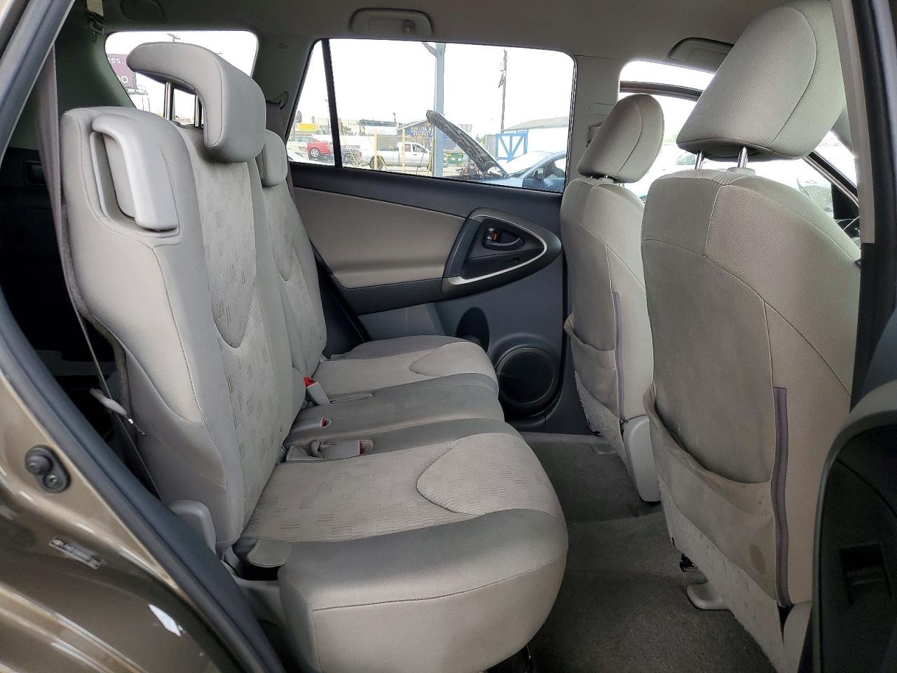 2009 Toyota Rav4 Base Tan vin: JTMZF33V095013460