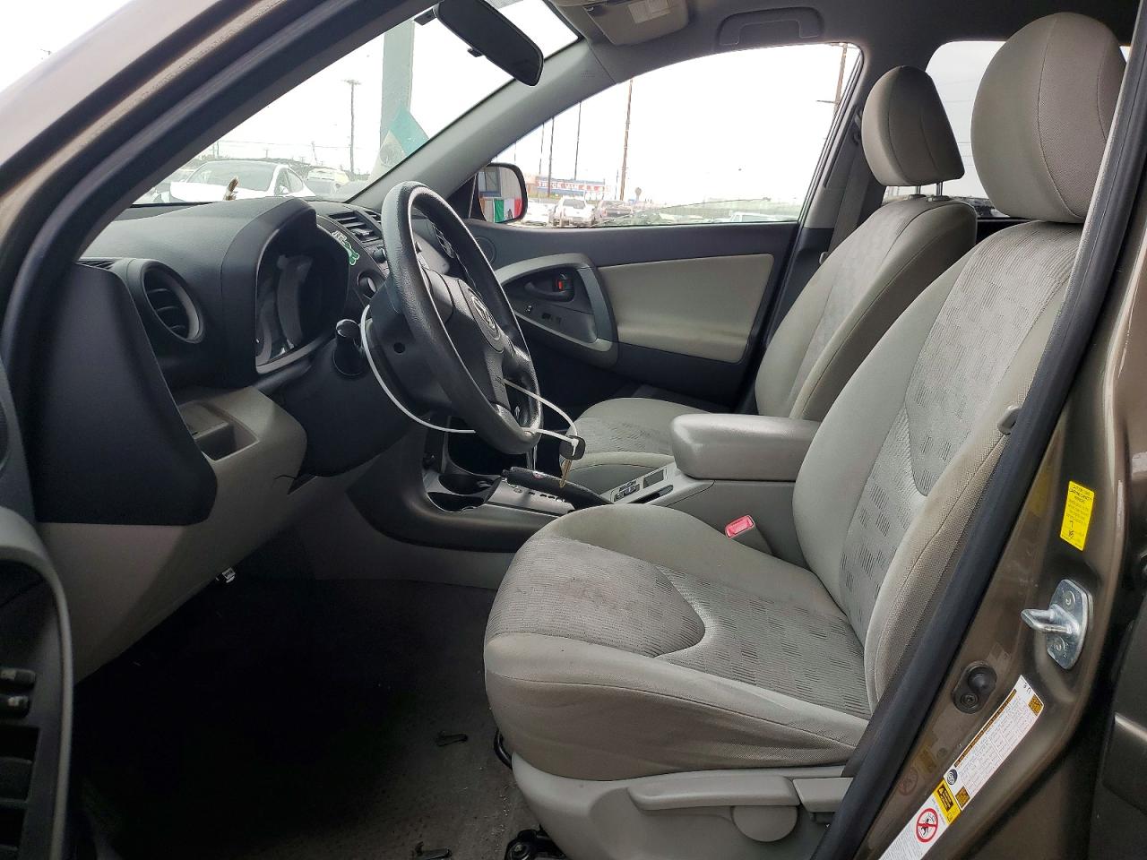 2009 Toyota Rav4 Base Tan vin: JTMZF33V095013460