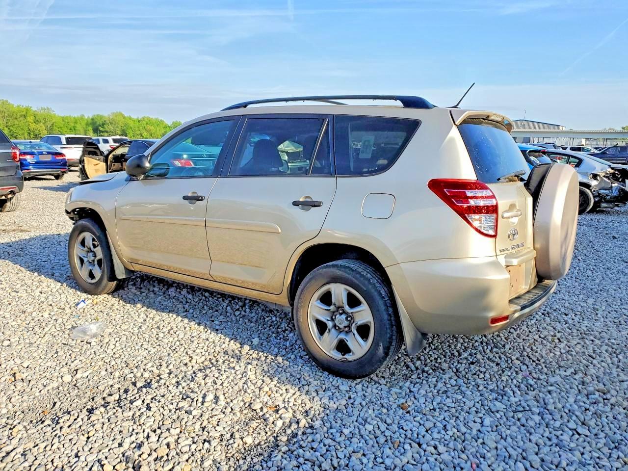 2009 Toyota Rav4 Base Tan vin: JTMZF33V09D014517