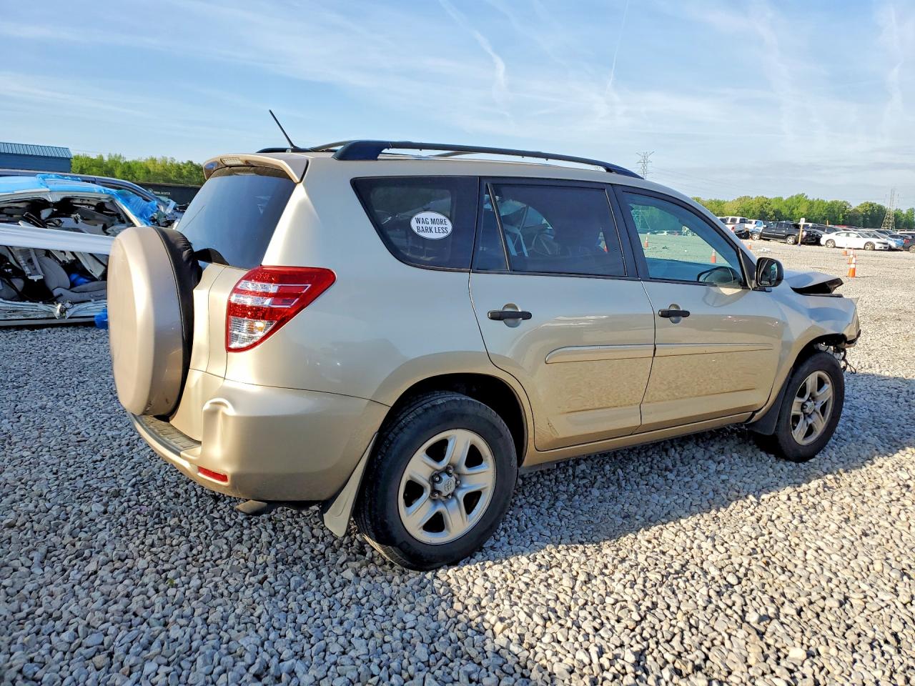 2009 Toyota Rav4 Base Tan vin: JTMZF33V09D014517