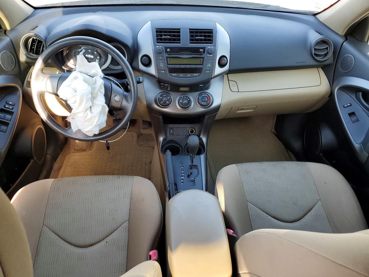 2009 Toyota Rav4 Base Tan vin: JTMZF33V09D014517