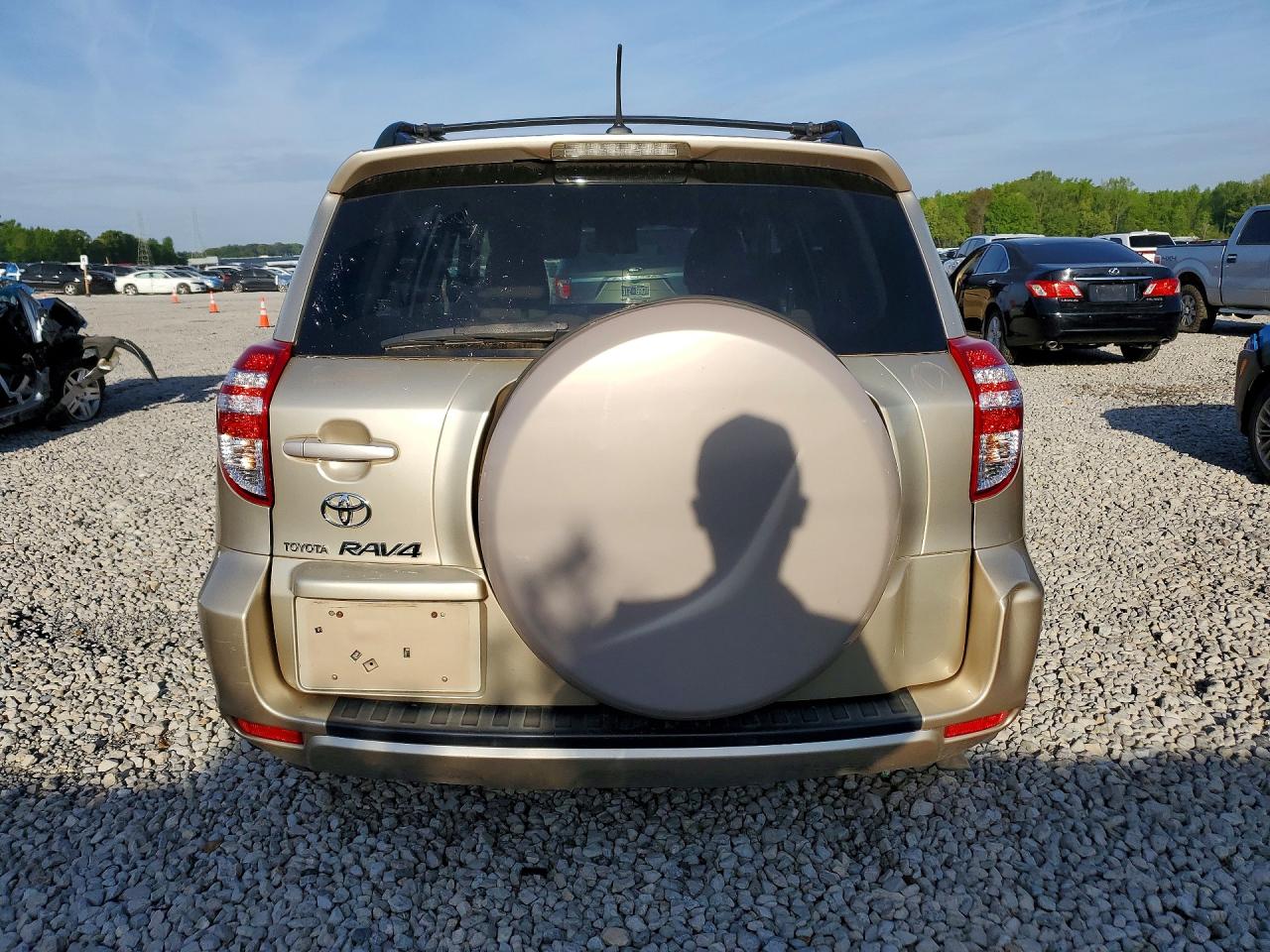 2009 Toyota Rav4 Base Tan vin: JTMZF33V09D014517