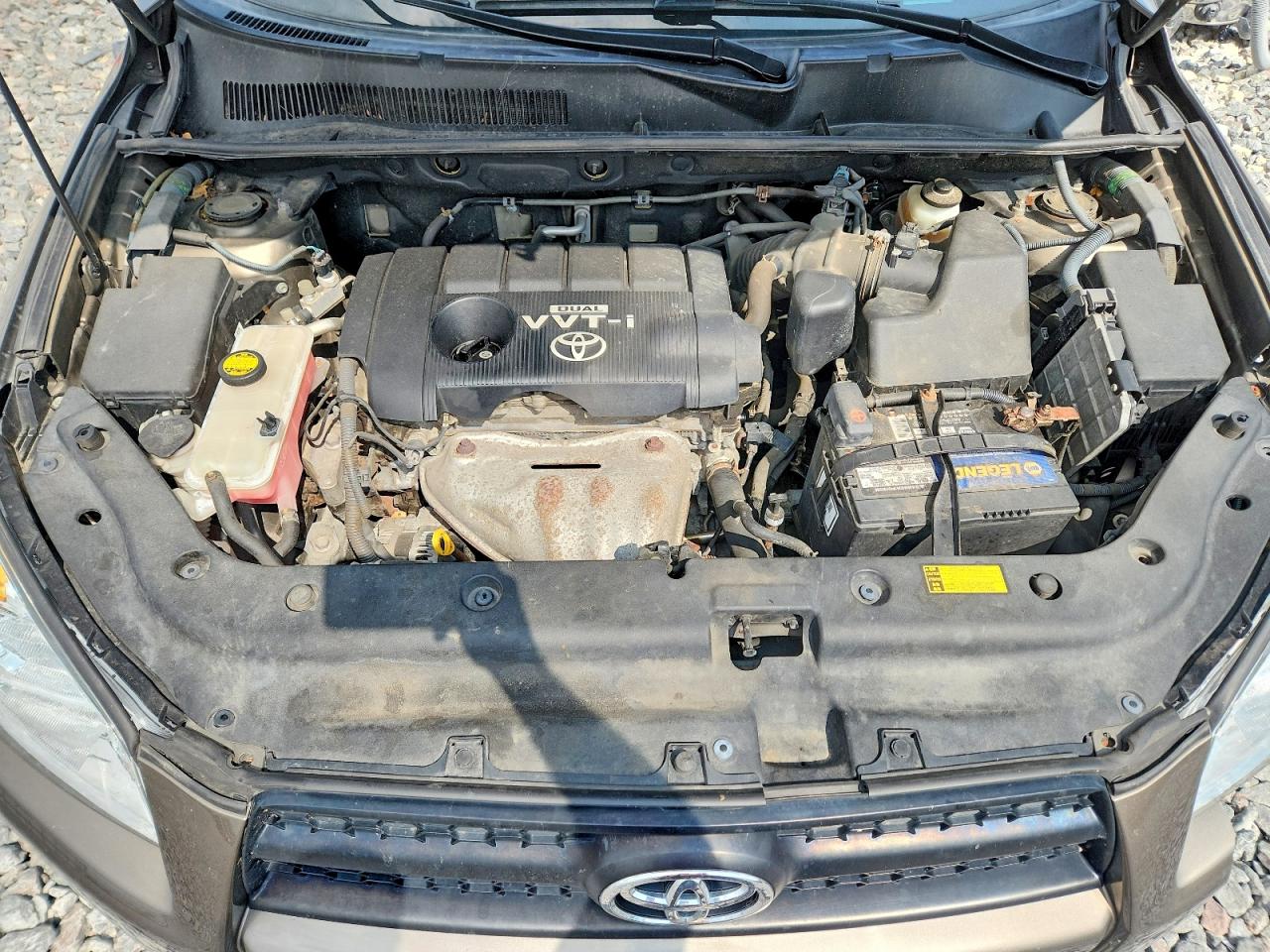 2009 Toyota Rav4 Base Tan vin: JTMZF33V195013418