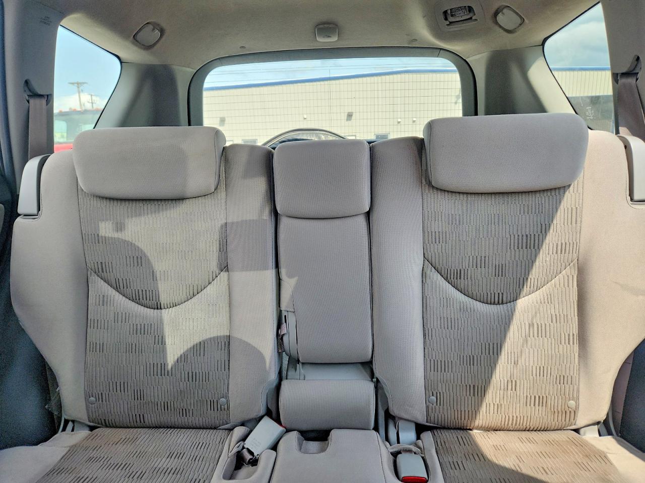 2009 Toyota Rav4 Base Tan vin: JTMZF33V195013418