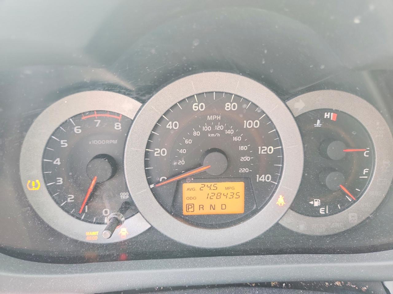 2009 Toyota Rav4 Base Tan vin: JTMZF33V195013418