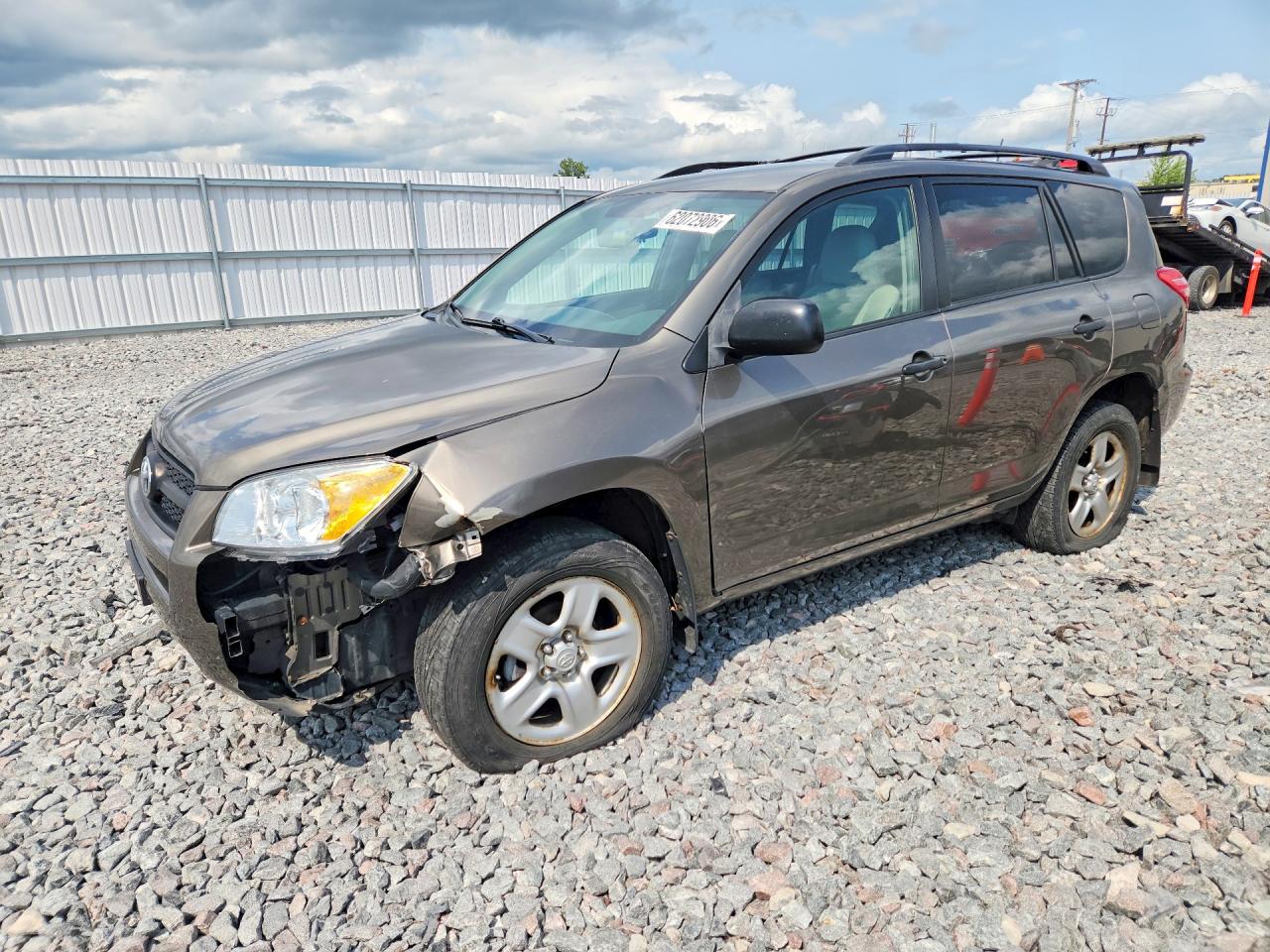 2009 Toyota Rav4 Base Tan vin: JTMZF33V195013418