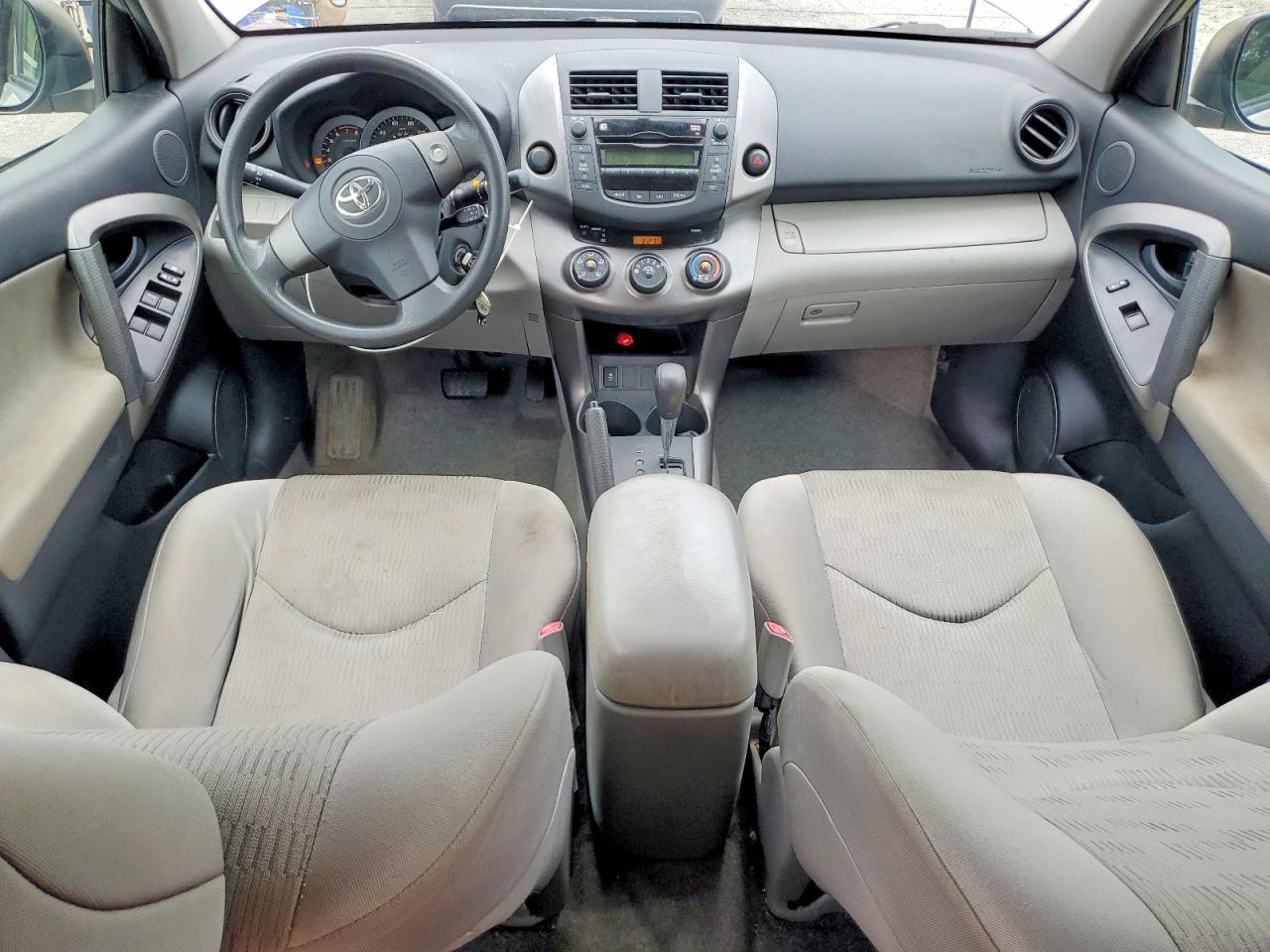 2009 Toyota Rav4 Base Tan vin: JTMZF33V19D004062