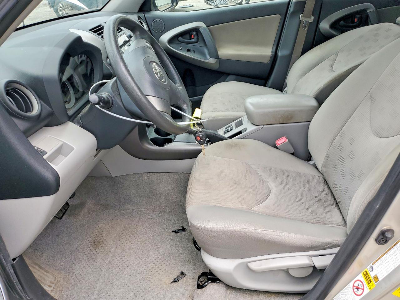 2009 Toyota Rav4 Base Tan vin: JTMZF33V19D004062
