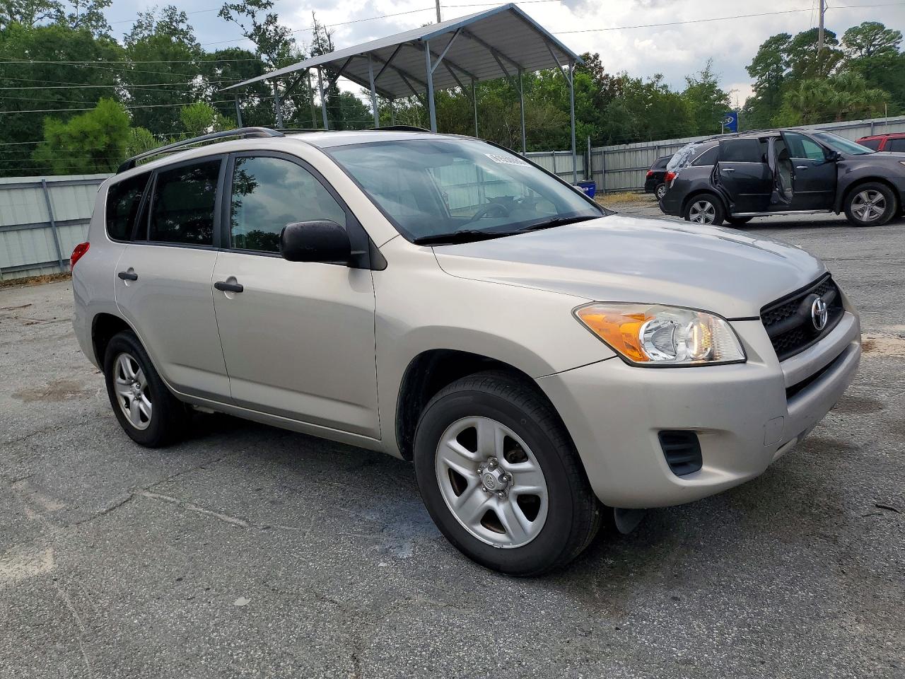 2009 Toyota Rav4 Base Tan vin: JTMZF33V19D004062