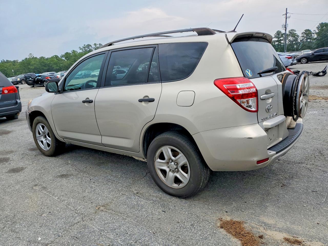 2009 Toyota Rav4 Base Tan vin: JTMZF33V19D004062