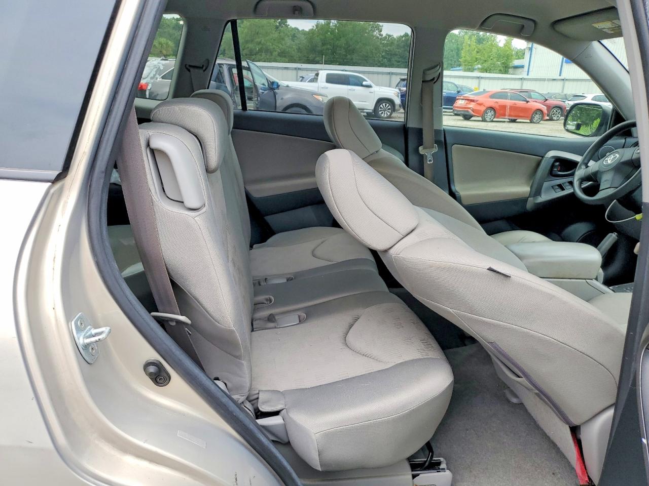 2009 Toyota Rav4 Base Tan vin: JTMZF33V19D004062