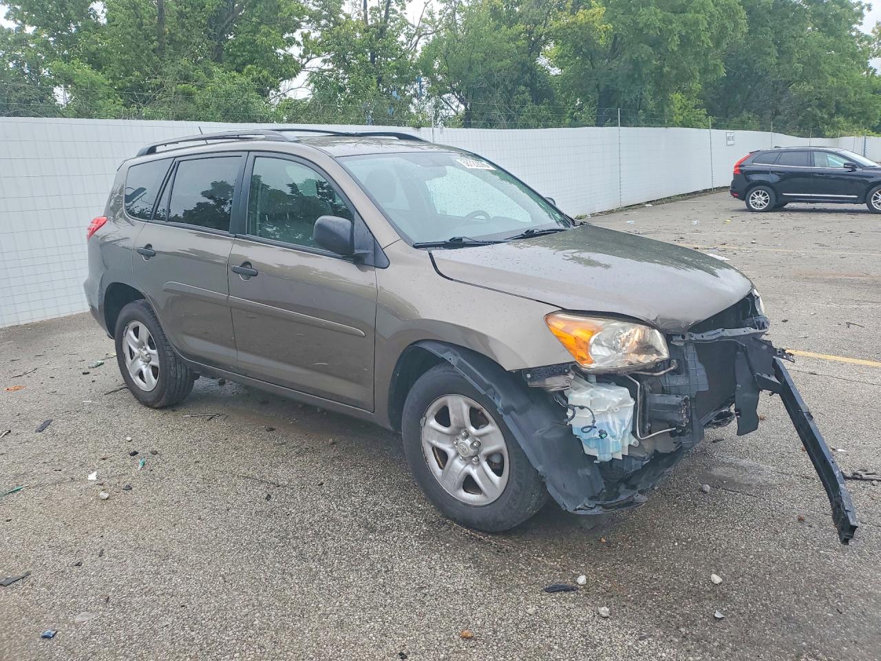 2009 Toyota Rav4 Base Tan vin: JTMZF33V495002171