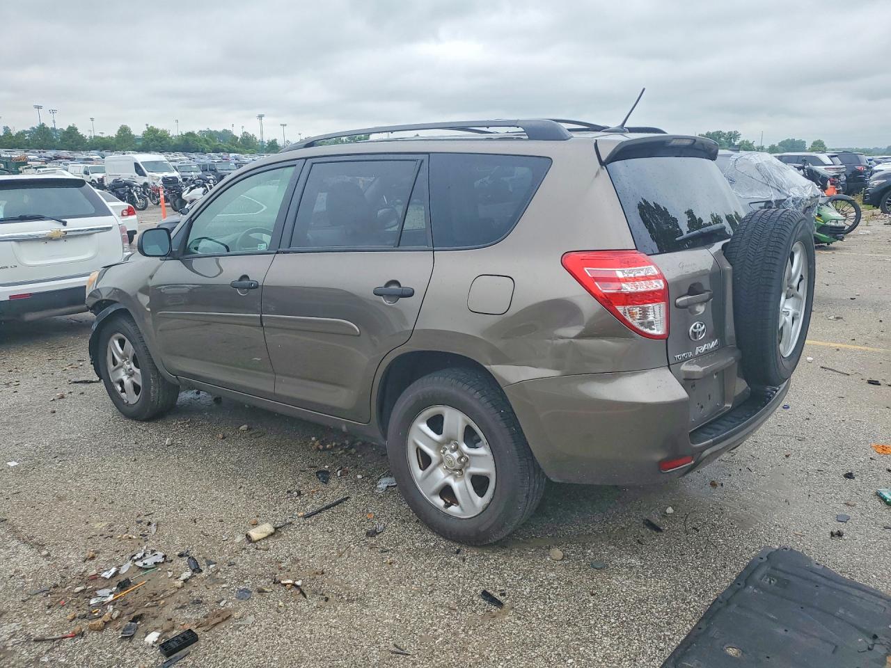 2009 Toyota Rav4 Base Tan vin: JTMZF33V495002171