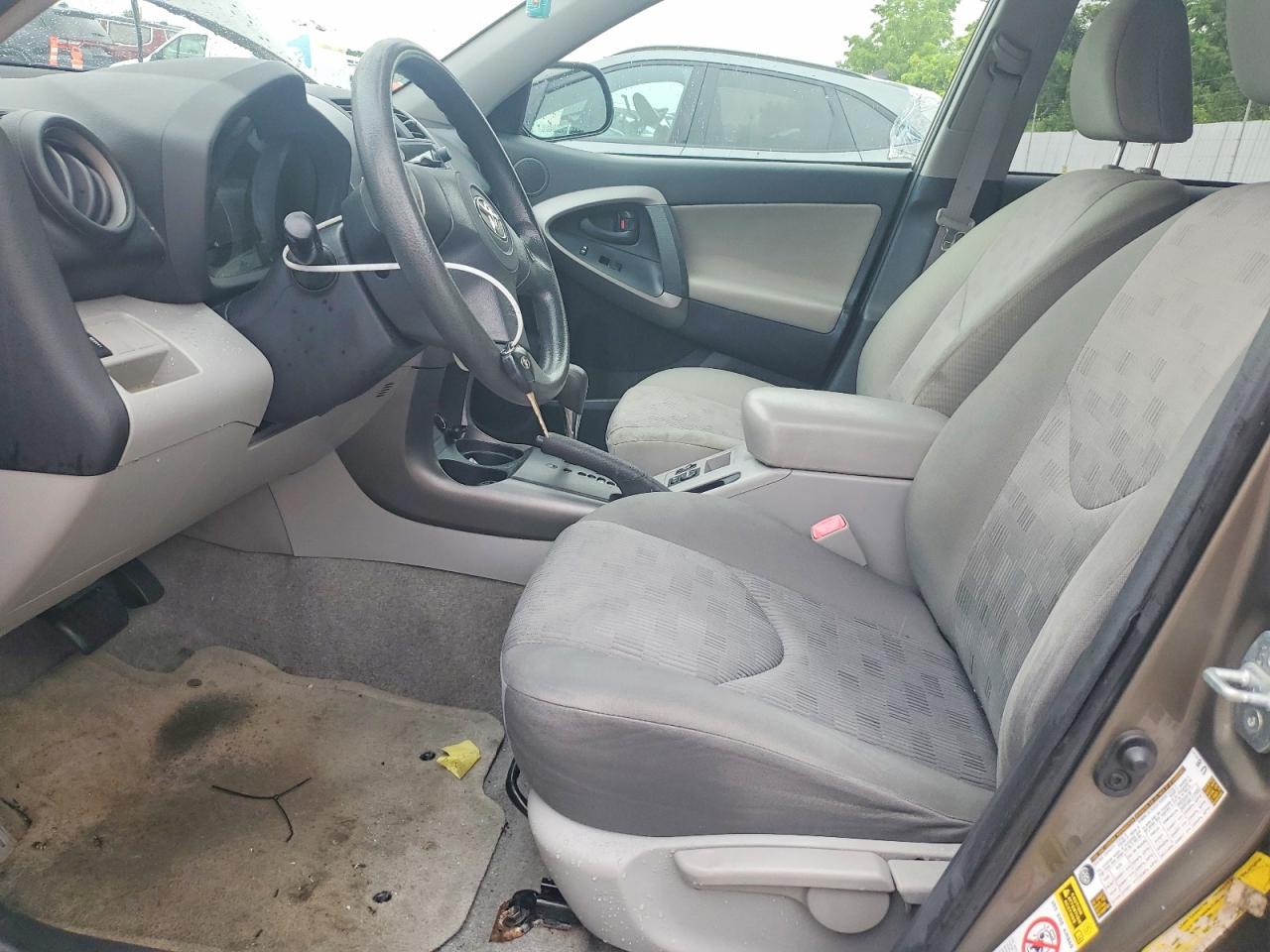 2009 Toyota Rav4 Base Tan vin: JTMZF33V495002171