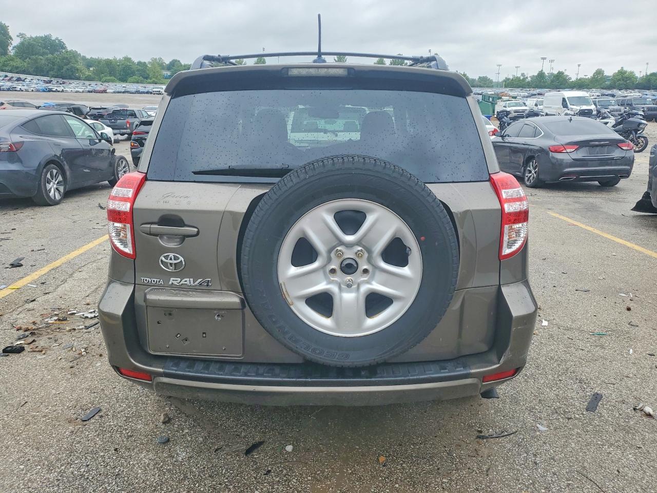 2009 Toyota Rav4 Base Tan vin: JTMZF33V495002171