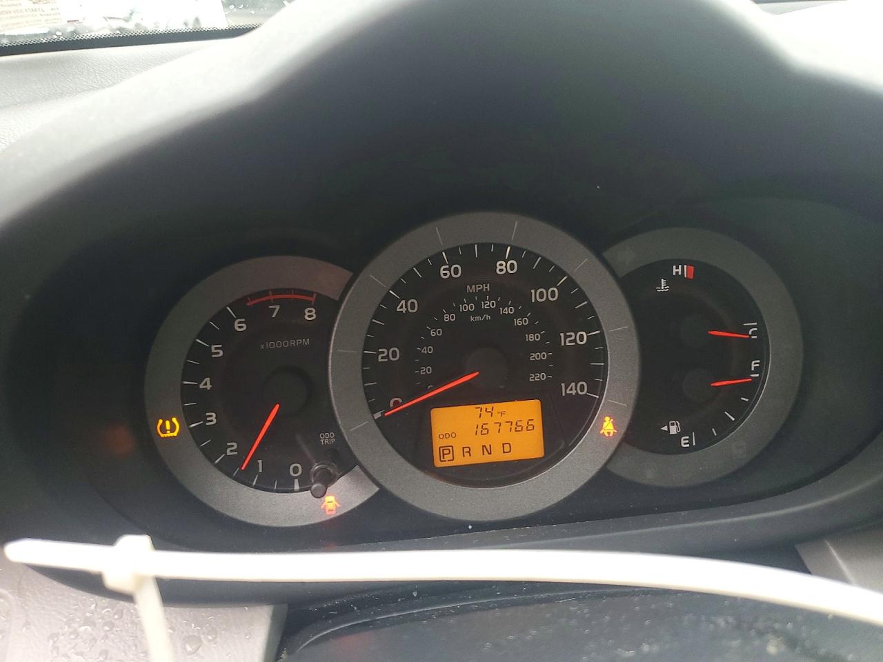 2009 Toyota Rav4 Base Tan vin: JTMZF33V495002171