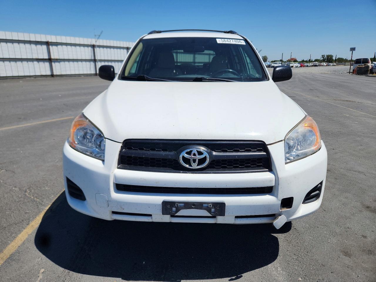 2009 Toyota Rav4 Base White vin: JTMZF33V59D014237