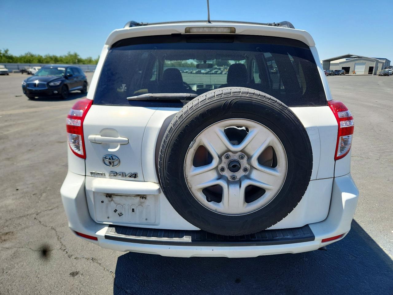 2009 Toyota Rav4 Base White vin: JTMZF33V59D014237