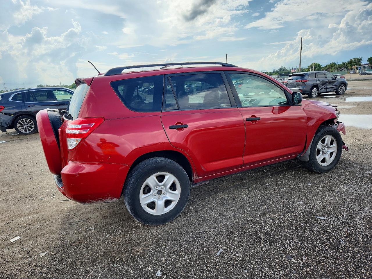 2009 Toyota Rav4 Base Red vin: JTMZF33V795001452