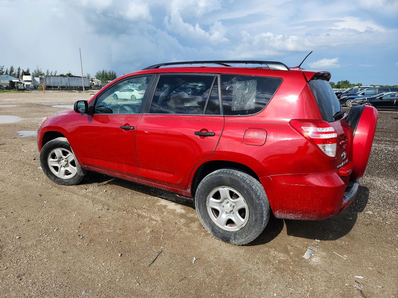2009 Toyota Rav4 Base Red vin: JTMZF33V795001452