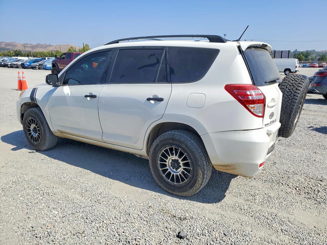 2009 Toyota Rav4 Base White vin: JTMZF33V79D014899