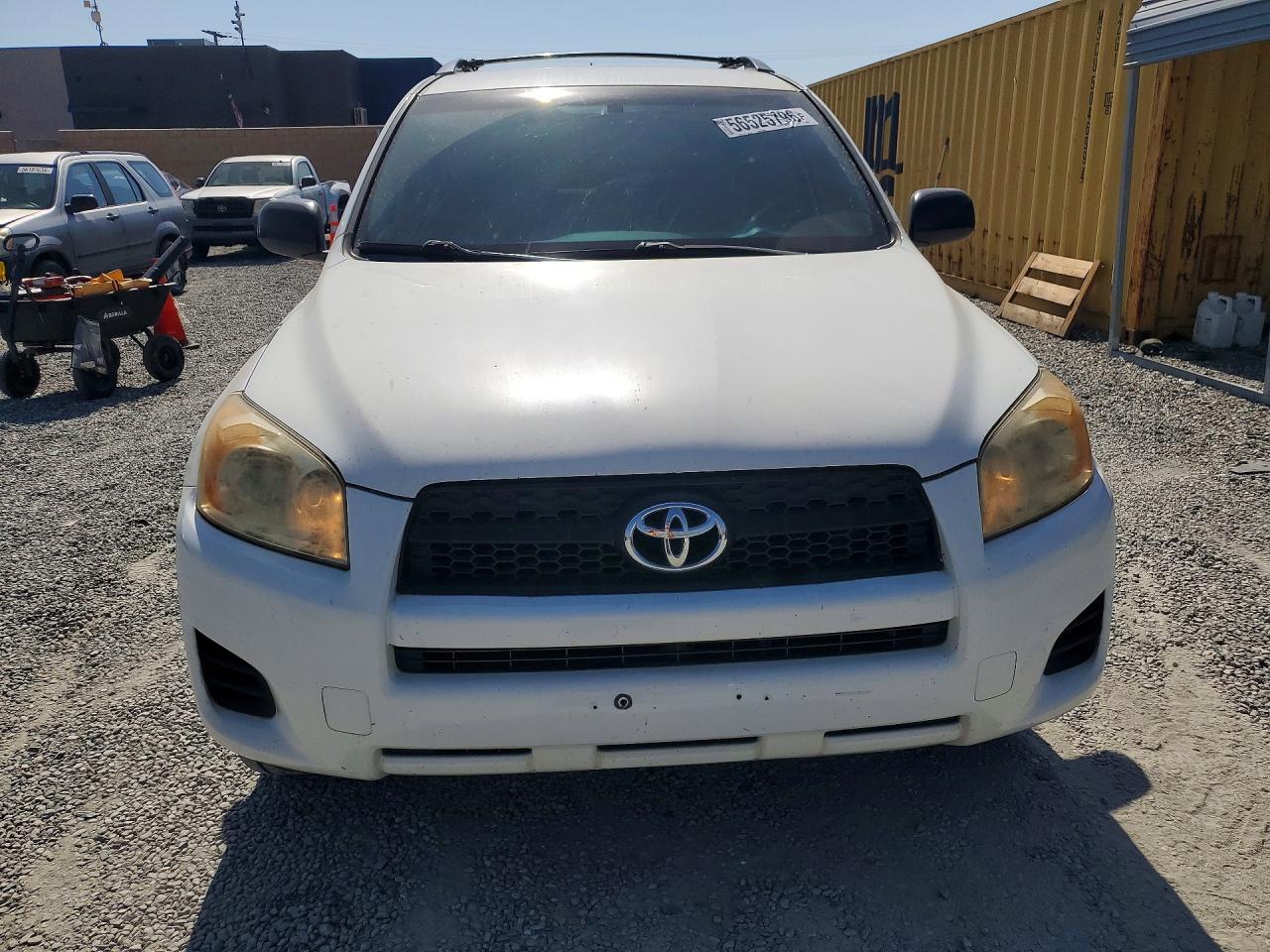 2009 Toyota Rav4 Base White vin: JTMZF33V79D014899
