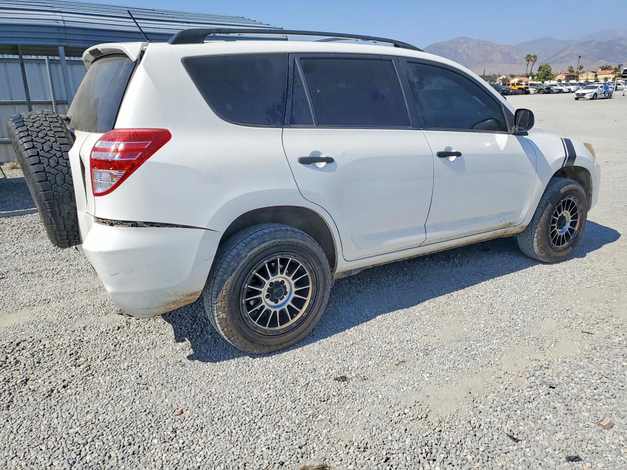 2009 Toyota Rav4 Base White vin: JTMZF33V79D014899