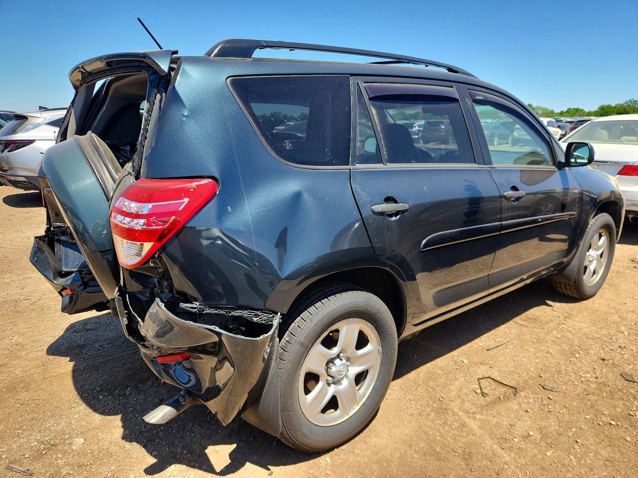 2009 Toyota Rav4 Base Green vin: JTMZF33V995012260