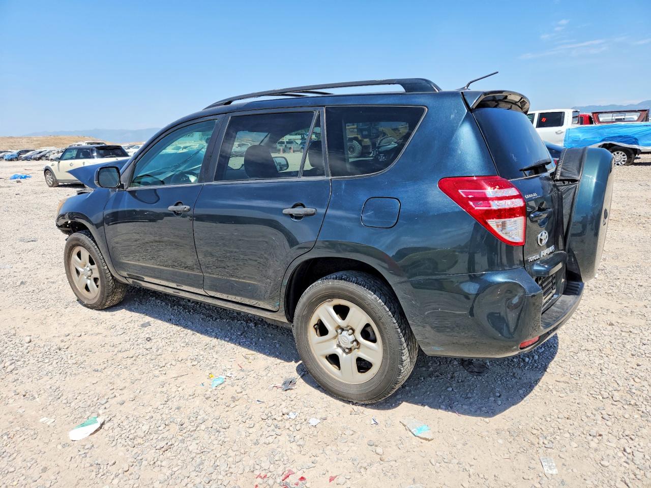 2009 Toyota Rav4 Base Blue vin: JTMZF33V99D002494