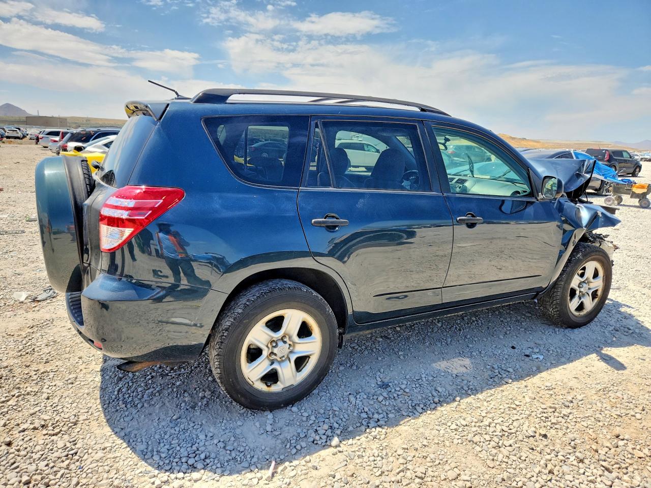2009 Toyota Rav4 Base Blue vin: JTMZF33V99D002494
