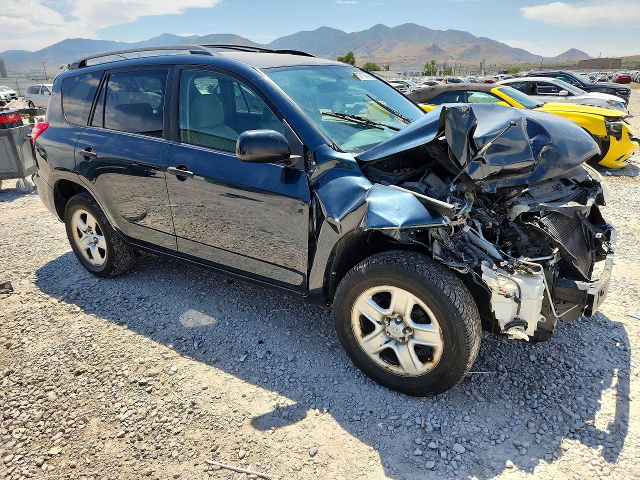 2009 Toyota Rav4 Base Blue vin: JTMZF33V99D002494