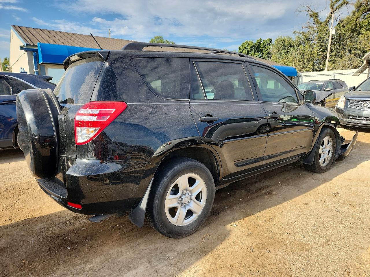 2009 Toyota Rav4 Base Black vin: JTMZF33V99D009106