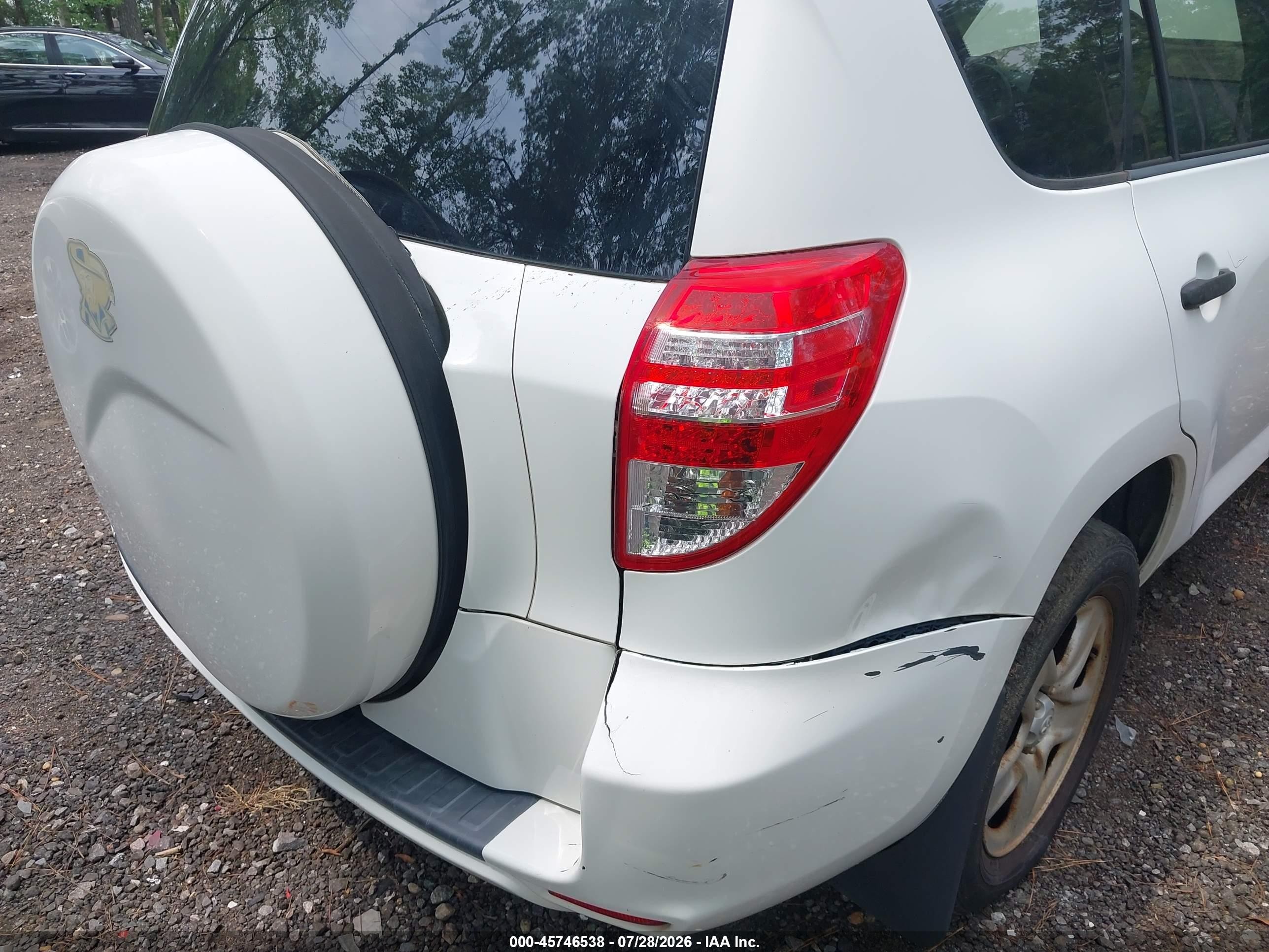 2009 Toyota Rav4   White vin: JTMZF33V99D014435