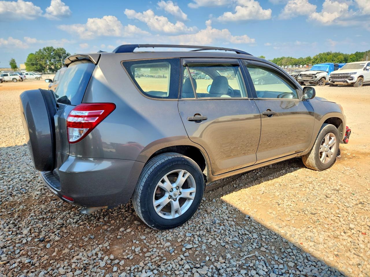 2009 Toyota Rav4 Base Brown vin: JTMZF33VX95006533