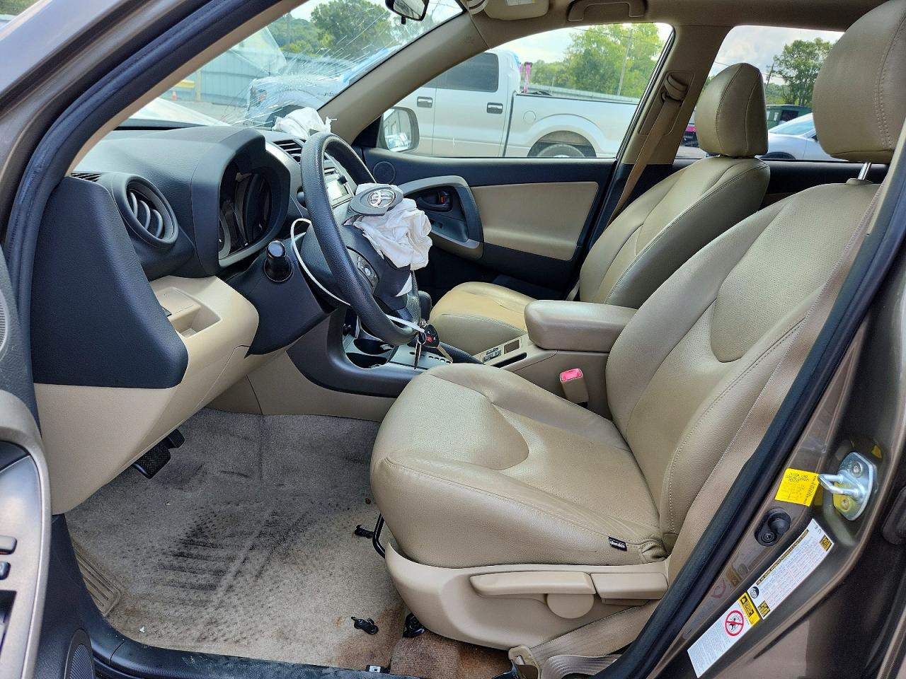 2012 Toyota Rav4 Base Tan vin: JTMZF4DV2C5045760