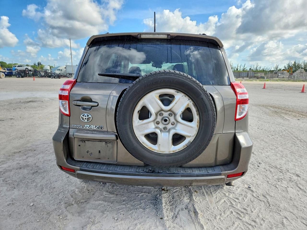 2010 Toyota Rav4 Base Tan vin: JTMZF4DV7AD026270