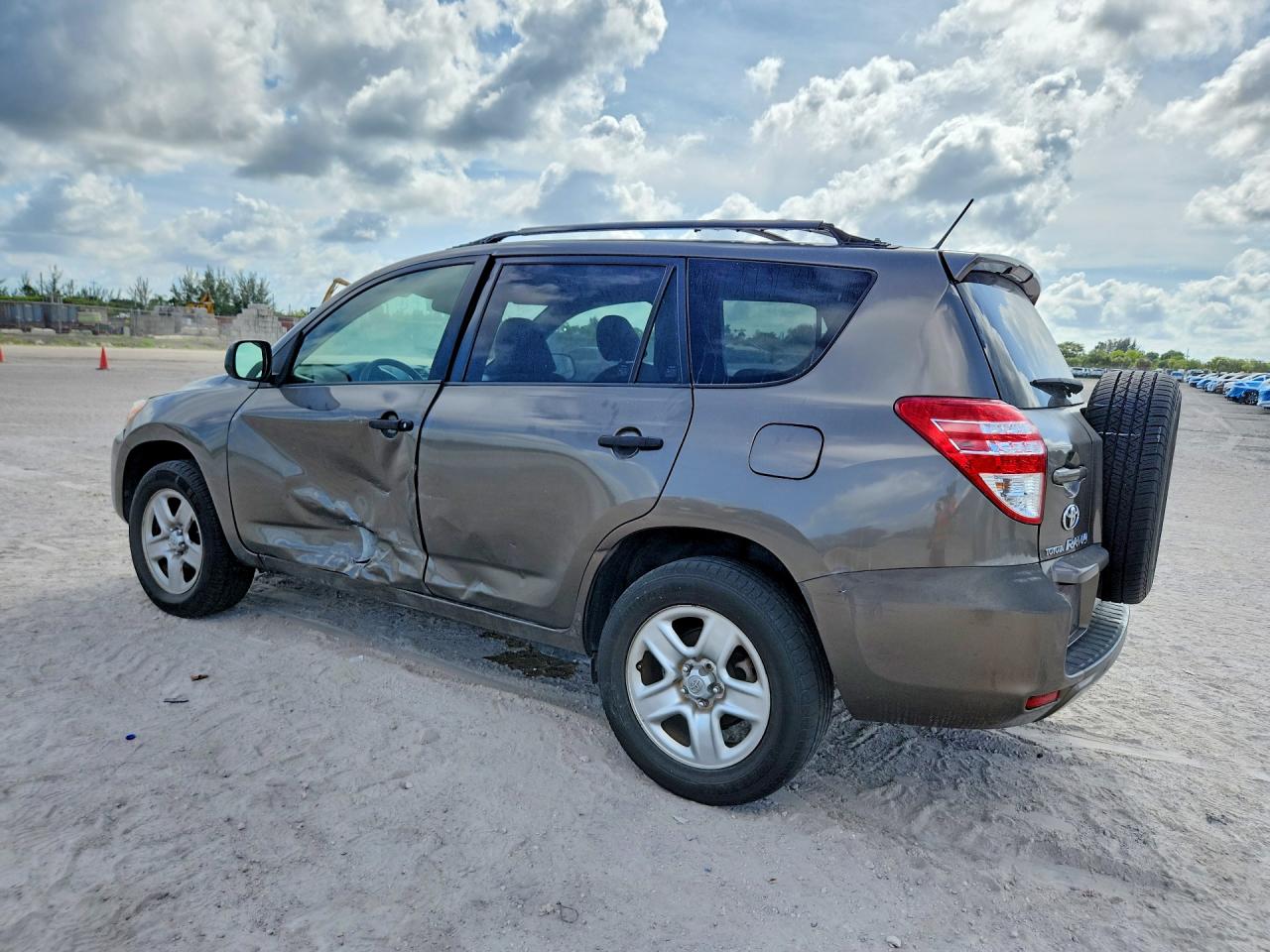 2010 Toyota Rav4 Base Tan vin: JTMZF4DV7AD026270