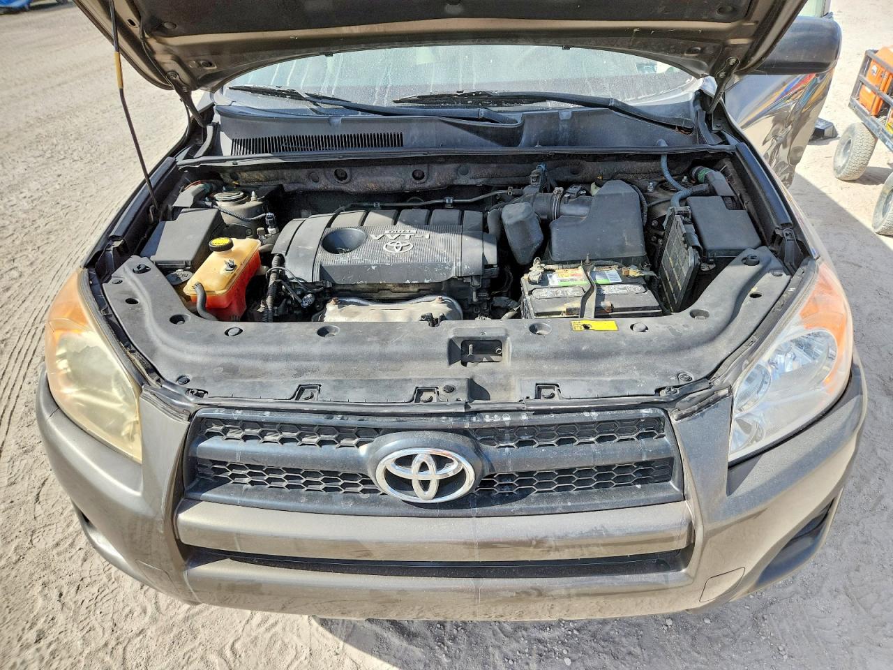 2010 Toyota Rav4 Base Tan vin: JTMZF4DV7AD026270