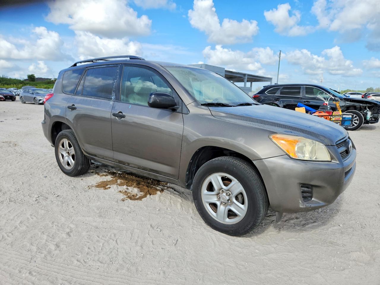 2010 Toyota Rav4 Base Tan vin: JTMZF4DV7AD026270