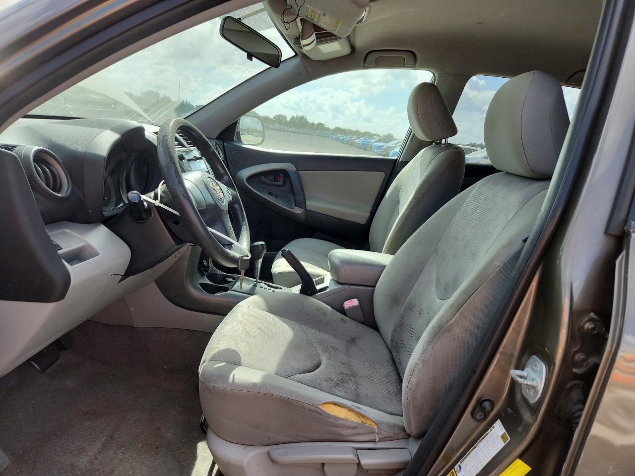 2010 Toyota Rav4 Base Tan vin: JTMZF4DV7AD026270