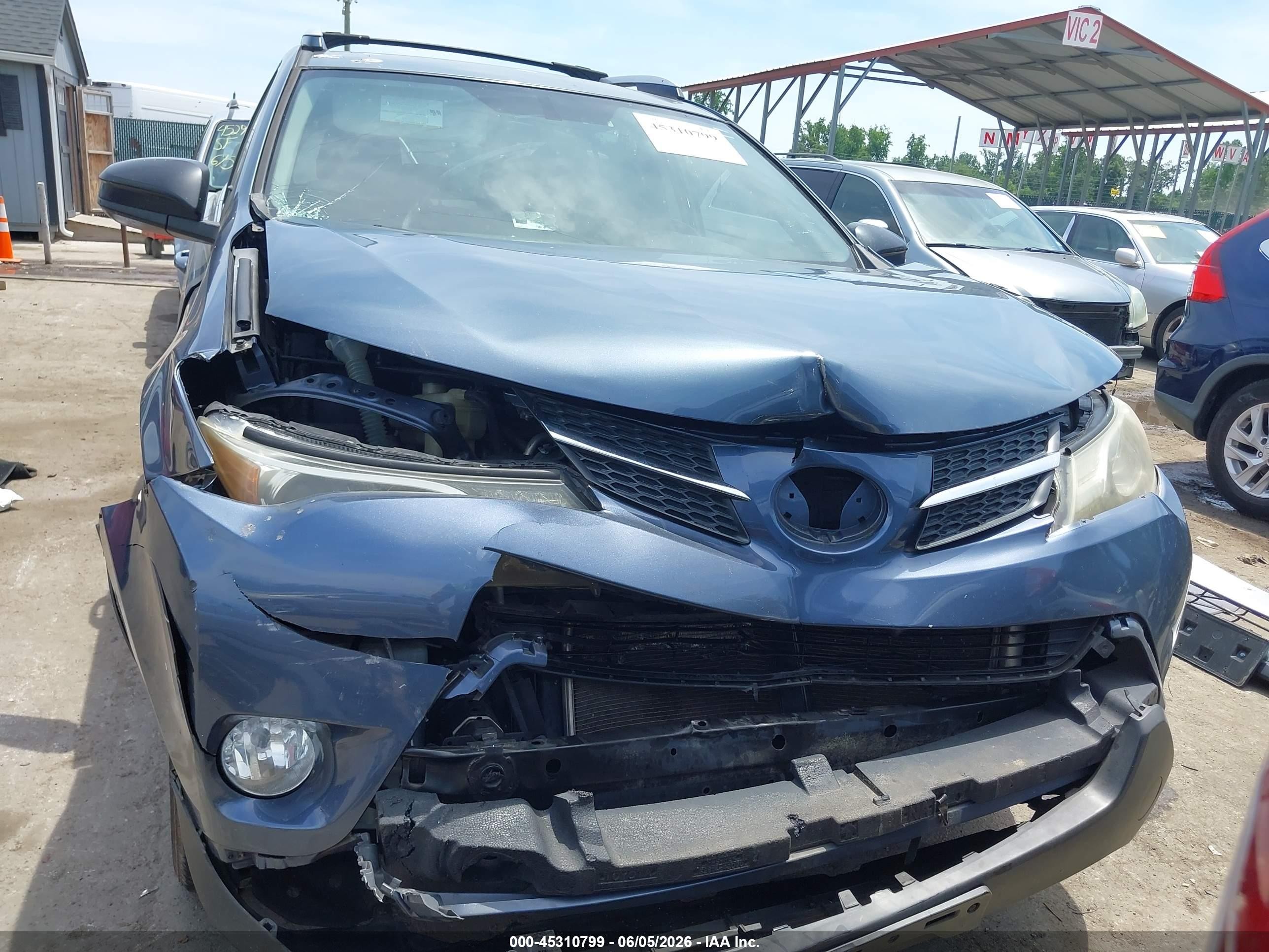 2014 Toyota Rav4 Le Blue vin: JTMZFREV5ED029945