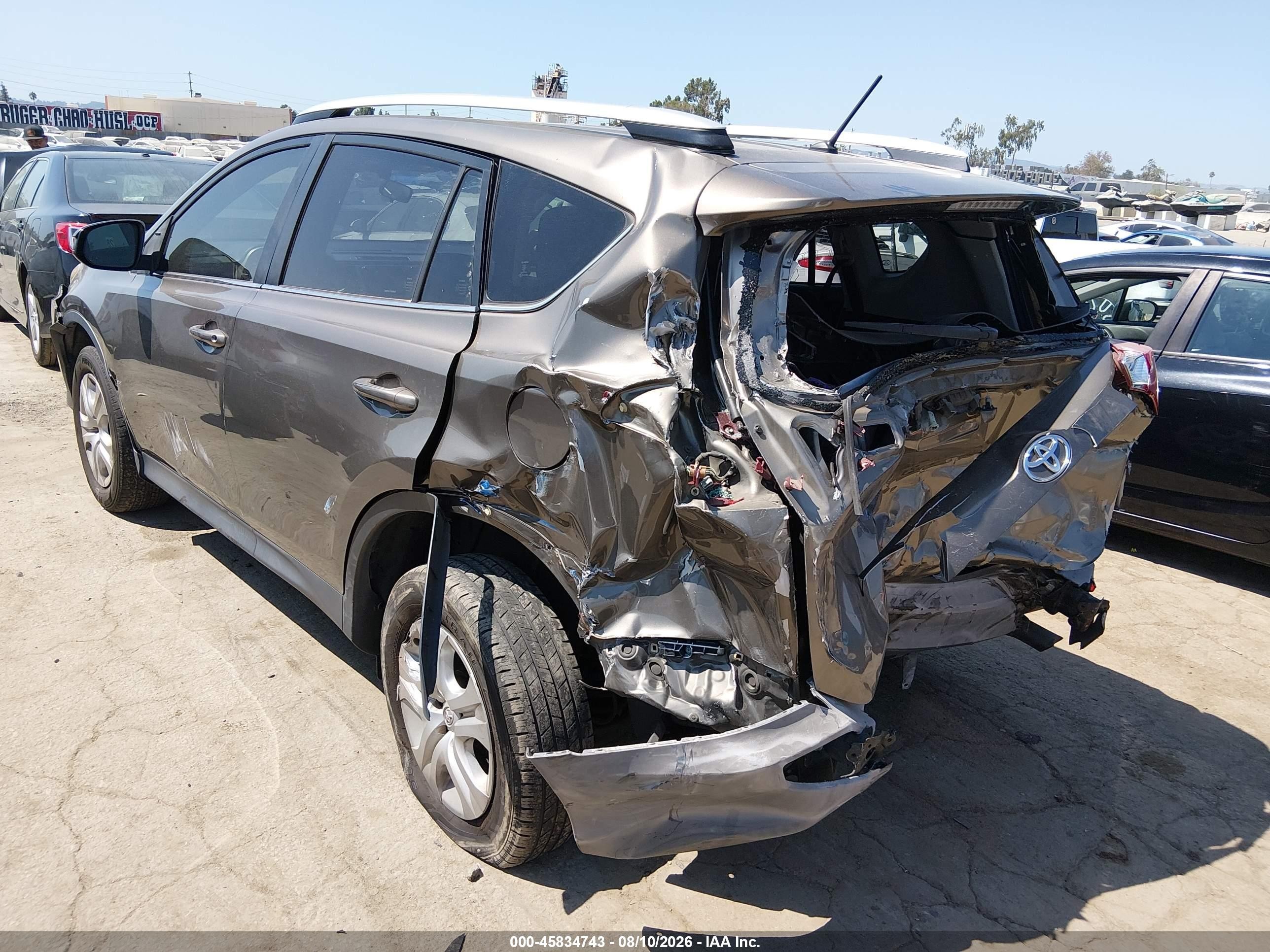 2015 Toyota Rav4 Le Brown vin: JTMZFREV7FD060633
