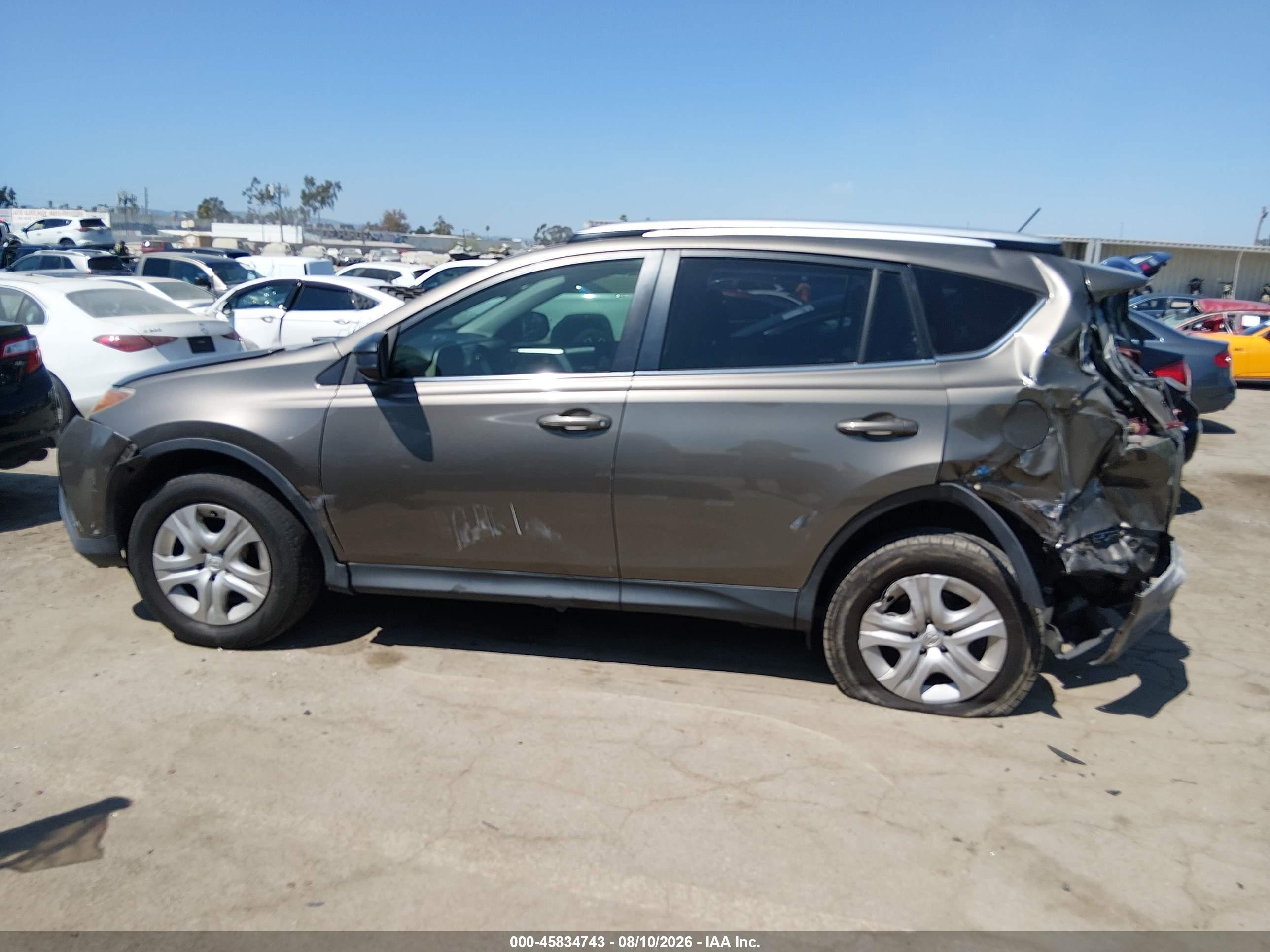 2015 Toyota Rav4 Le Brown vin: JTMZFREV7FD060633