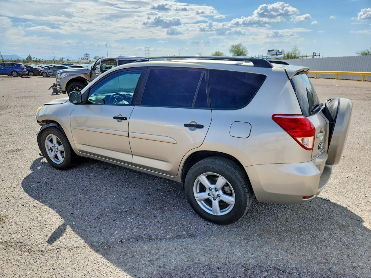 2007 Toyota Rav4 Base Tan vin: JTMZK33V976005117