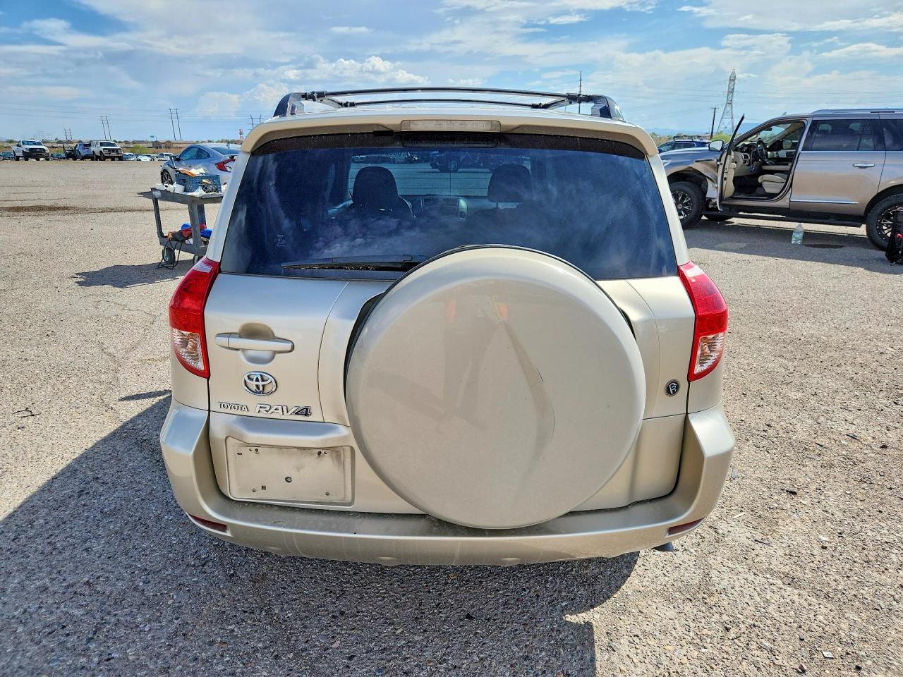 2007 Toyota Rav4 Base Tan vin: JTMZK33V976005117