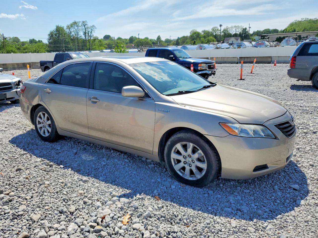 2007 Toyota Camry Hybrid Желто-коричневый vin: JTNBB46K073007747