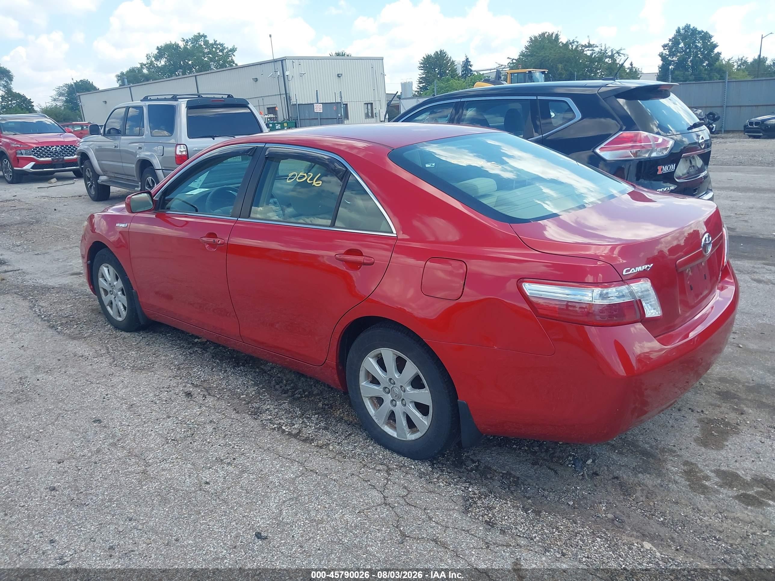 2007 Toyota Camry Hybrid   Red vin: JTNBB46K373002607